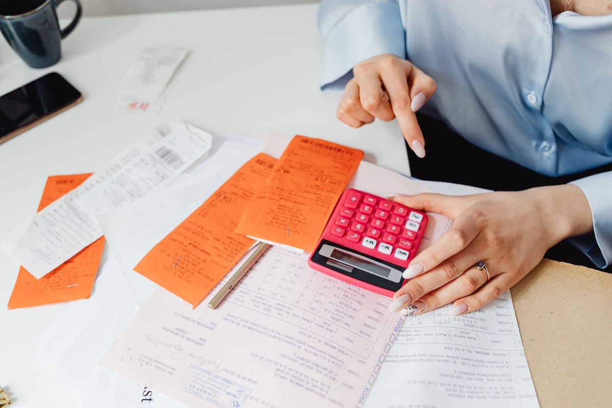 Sorting receipts and paperwork for a personal tax return