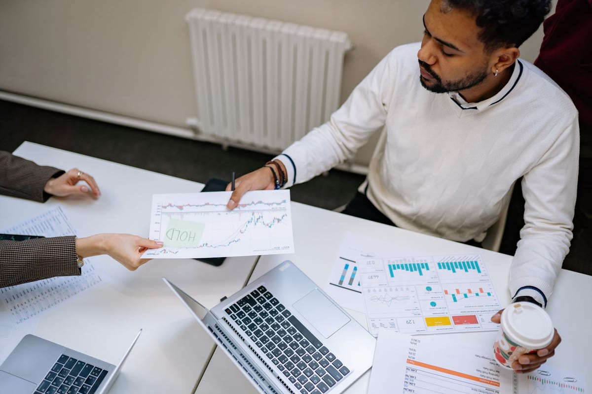 A professional practice owner meeting with an advisor